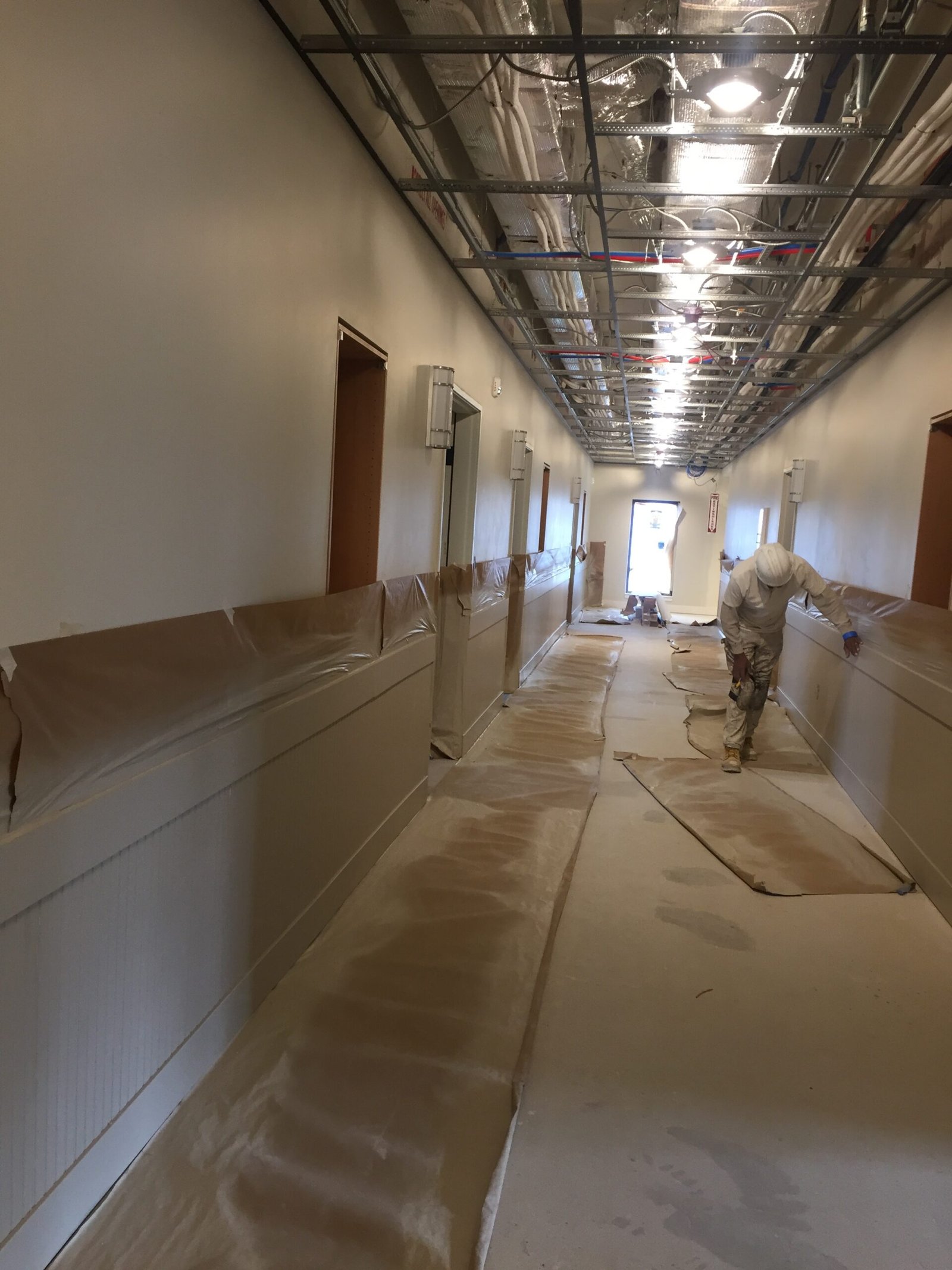 Commercial corridor painting in progress