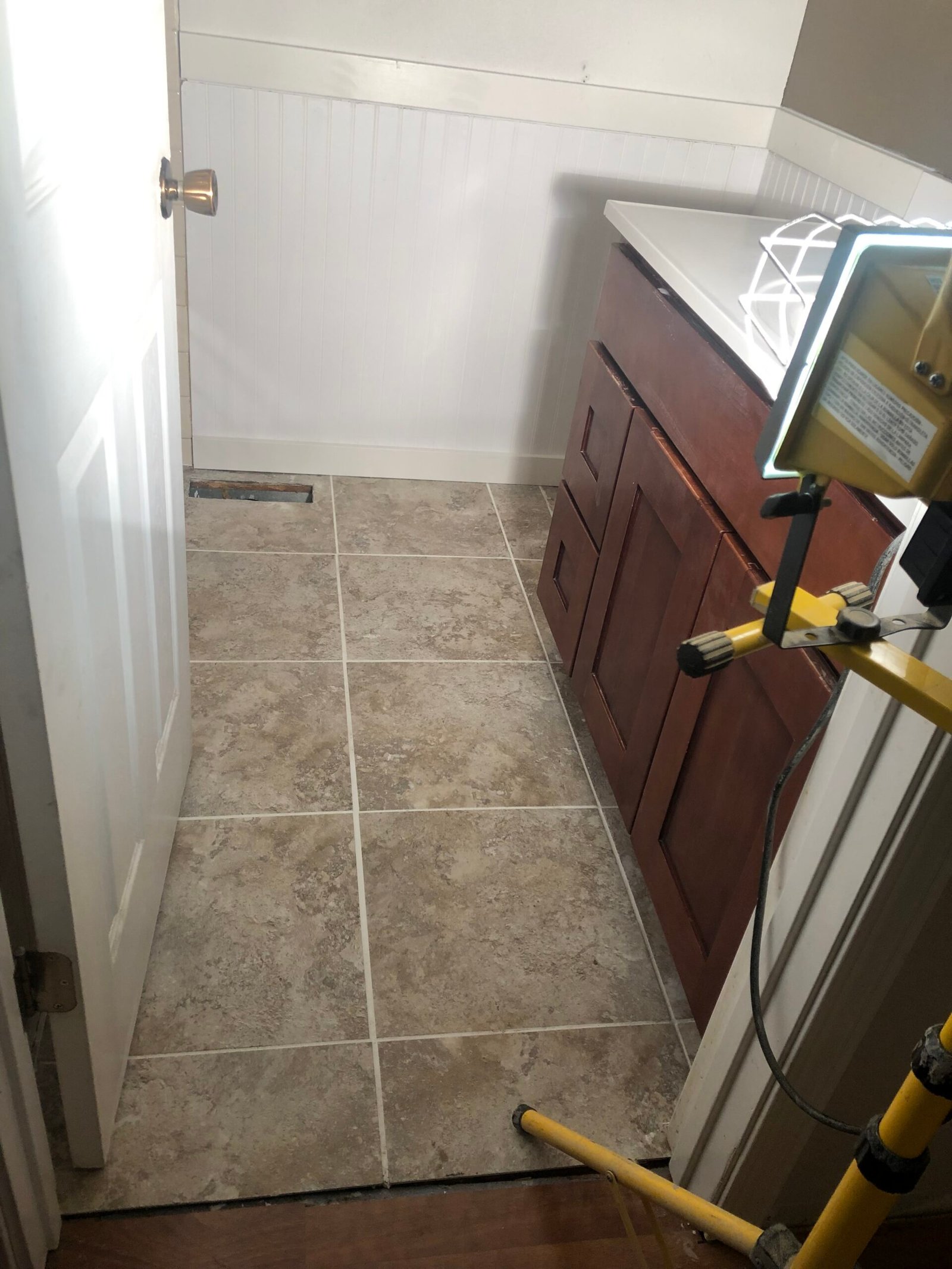Bathroom tile and trim work in progress