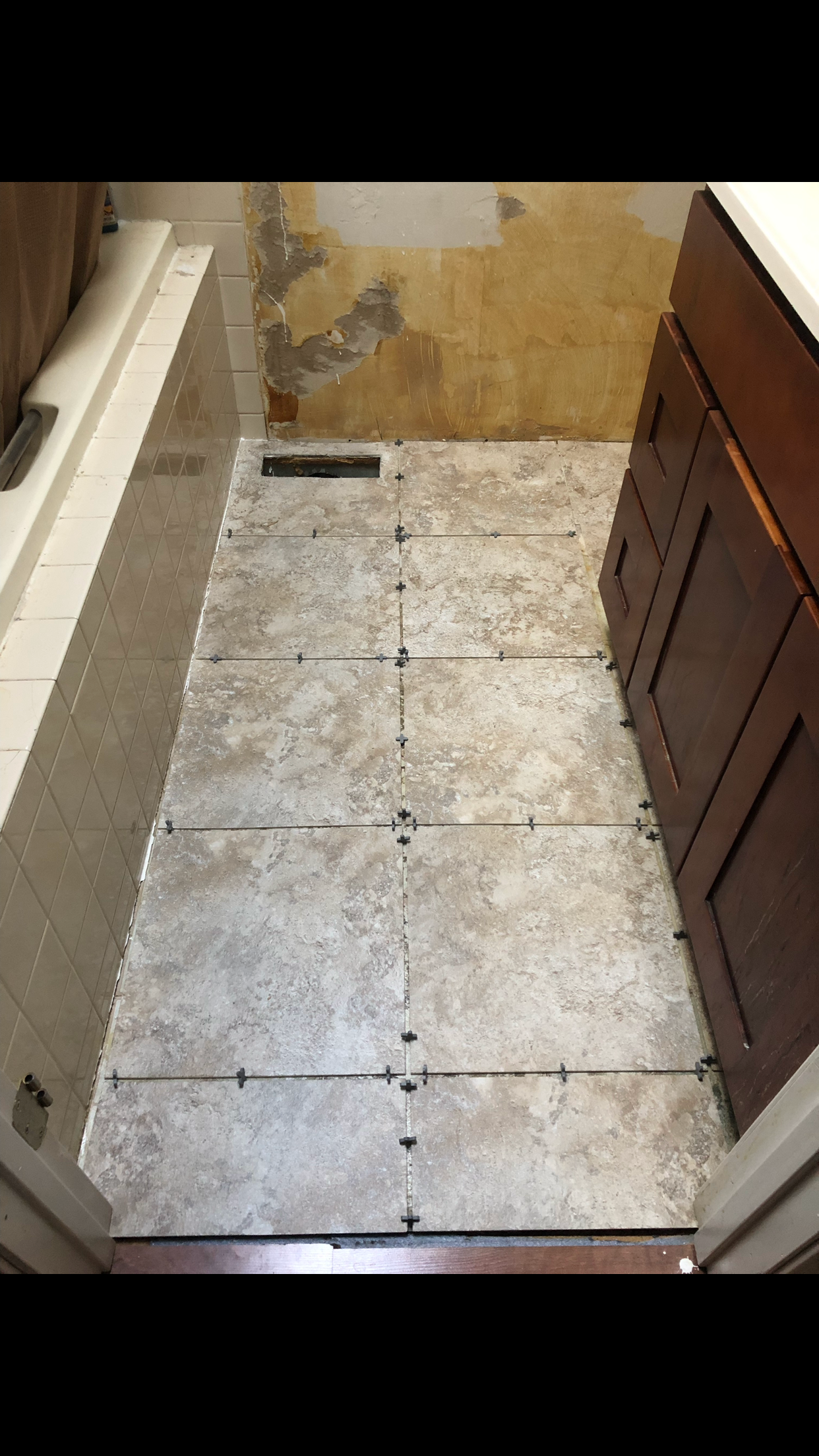 New bathroom tile installation in progress