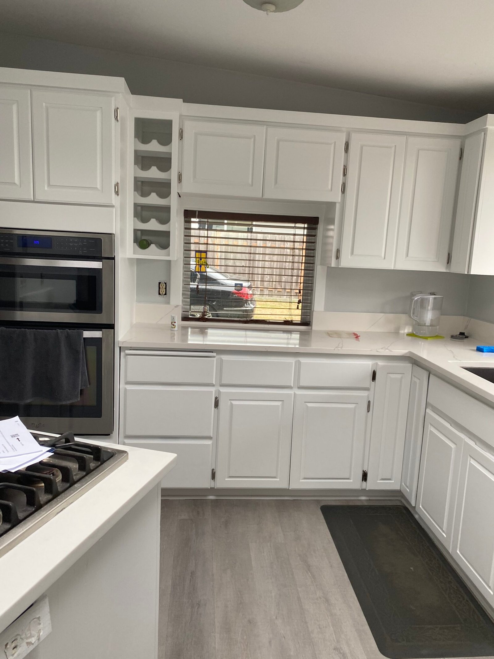 White kitchen cabinets after refinishing