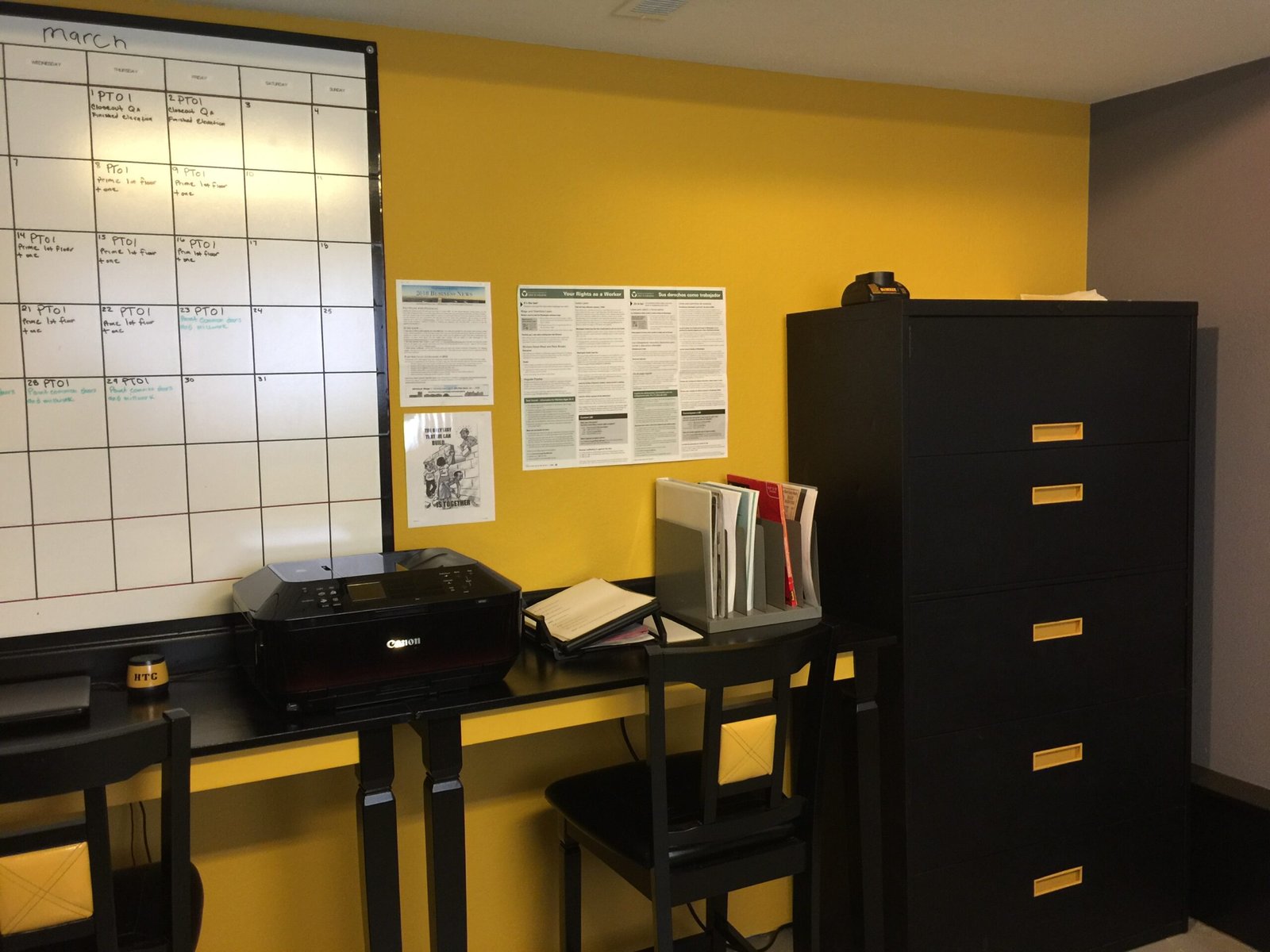 Commercial office painted in black, gray and yellow