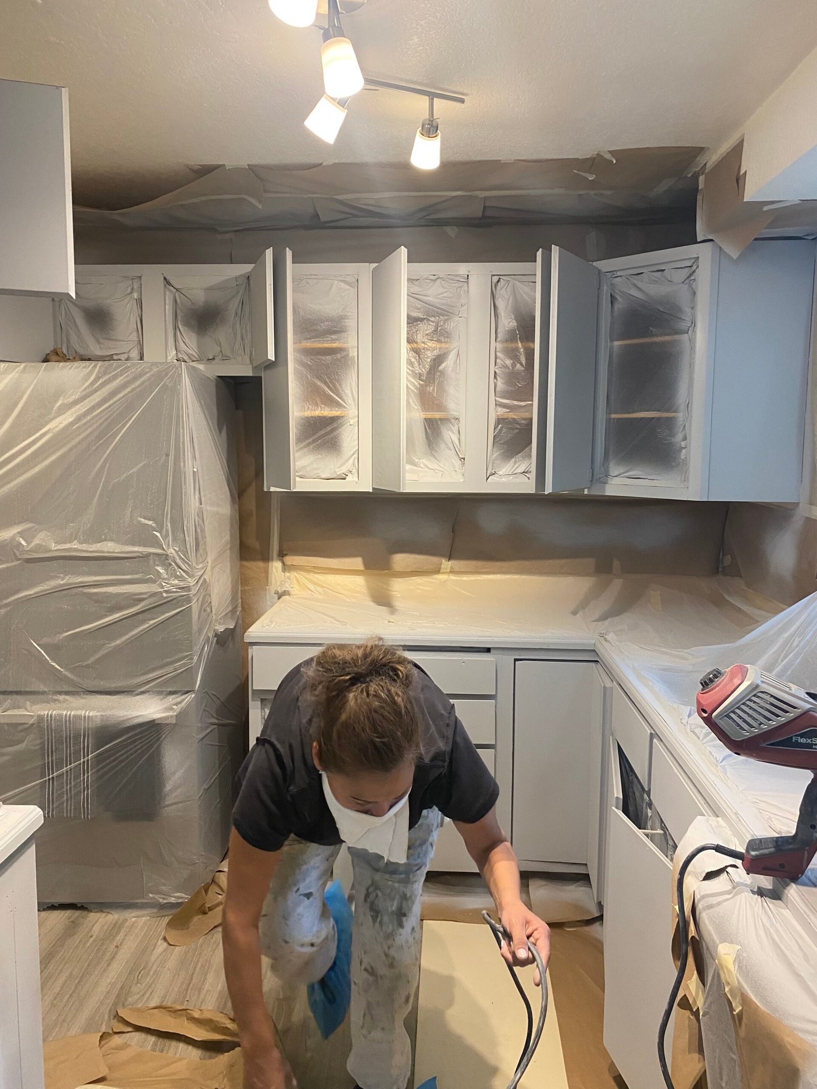 Flat-panel cabinet painting in progress