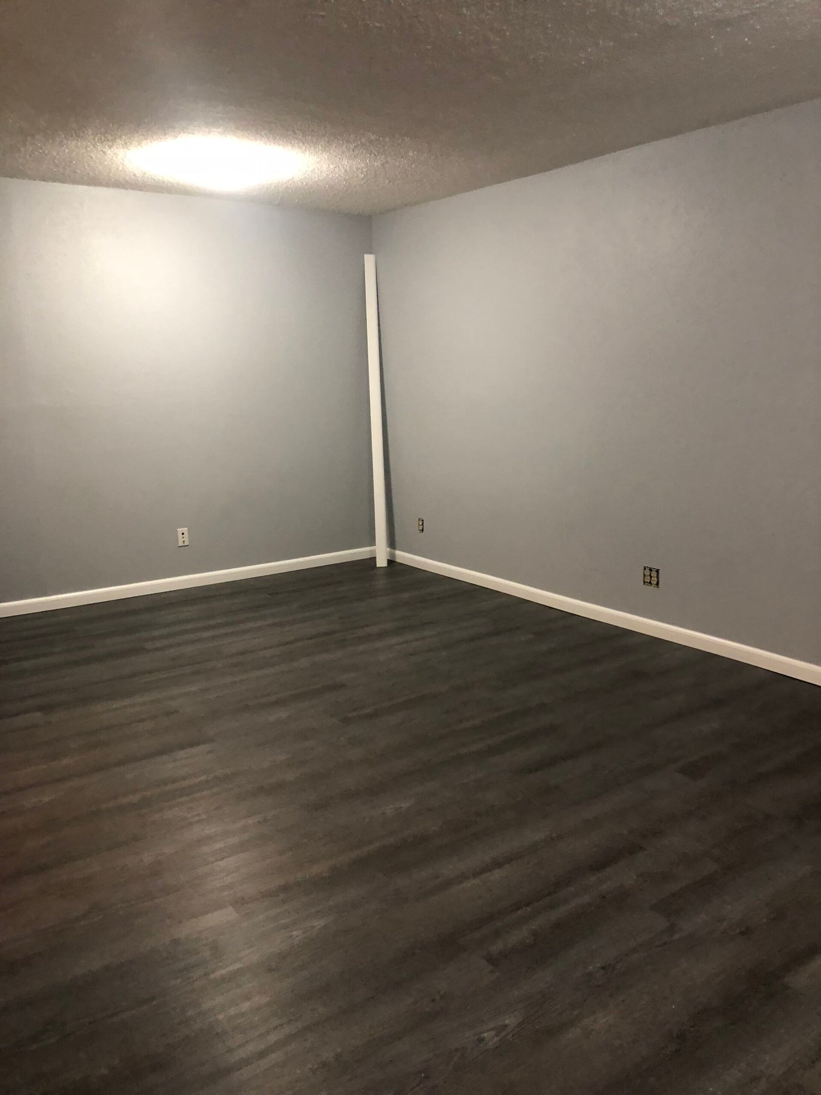 Completed gray flooring in finished room