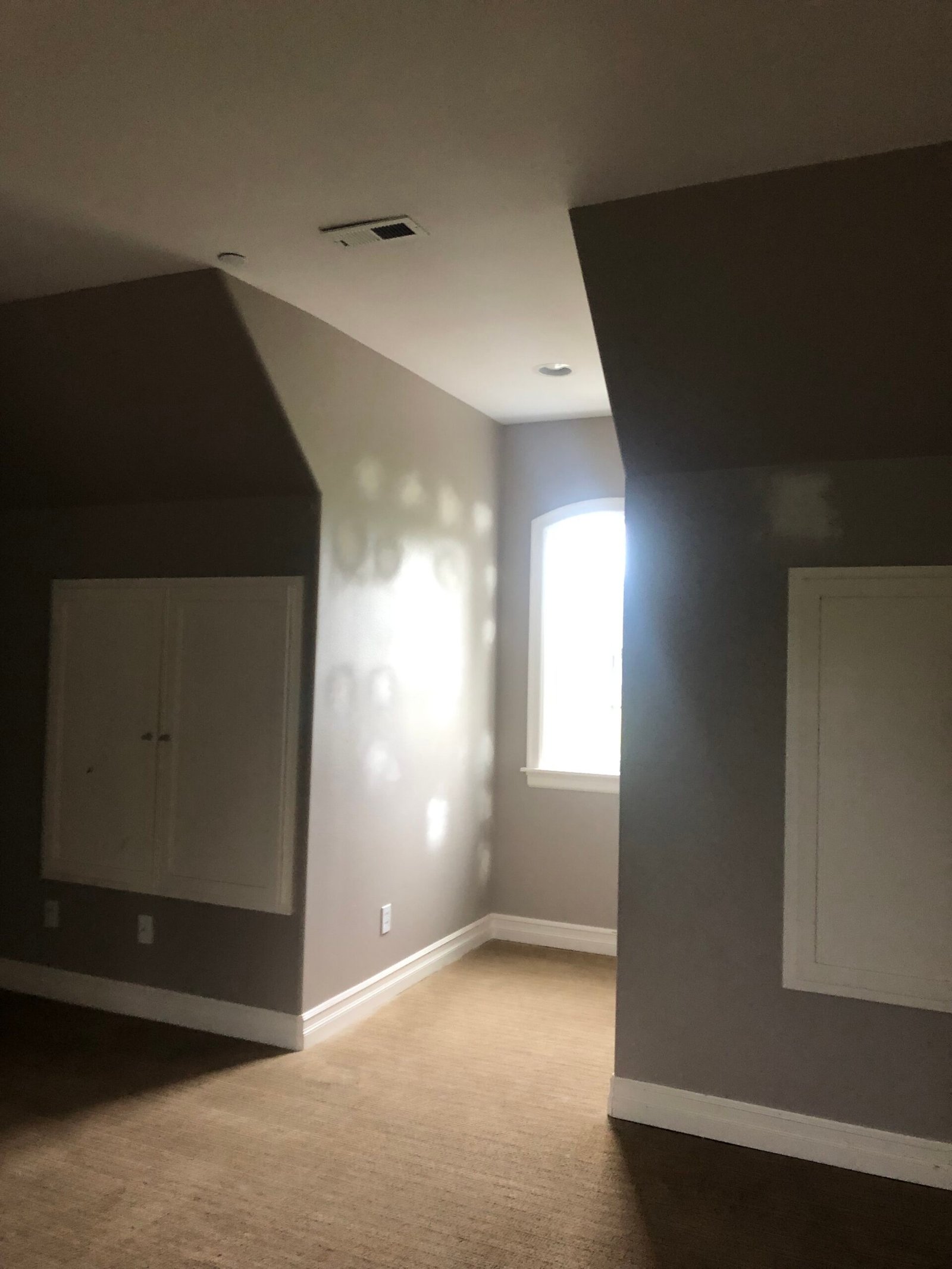 Completed theater hallway and wall finish