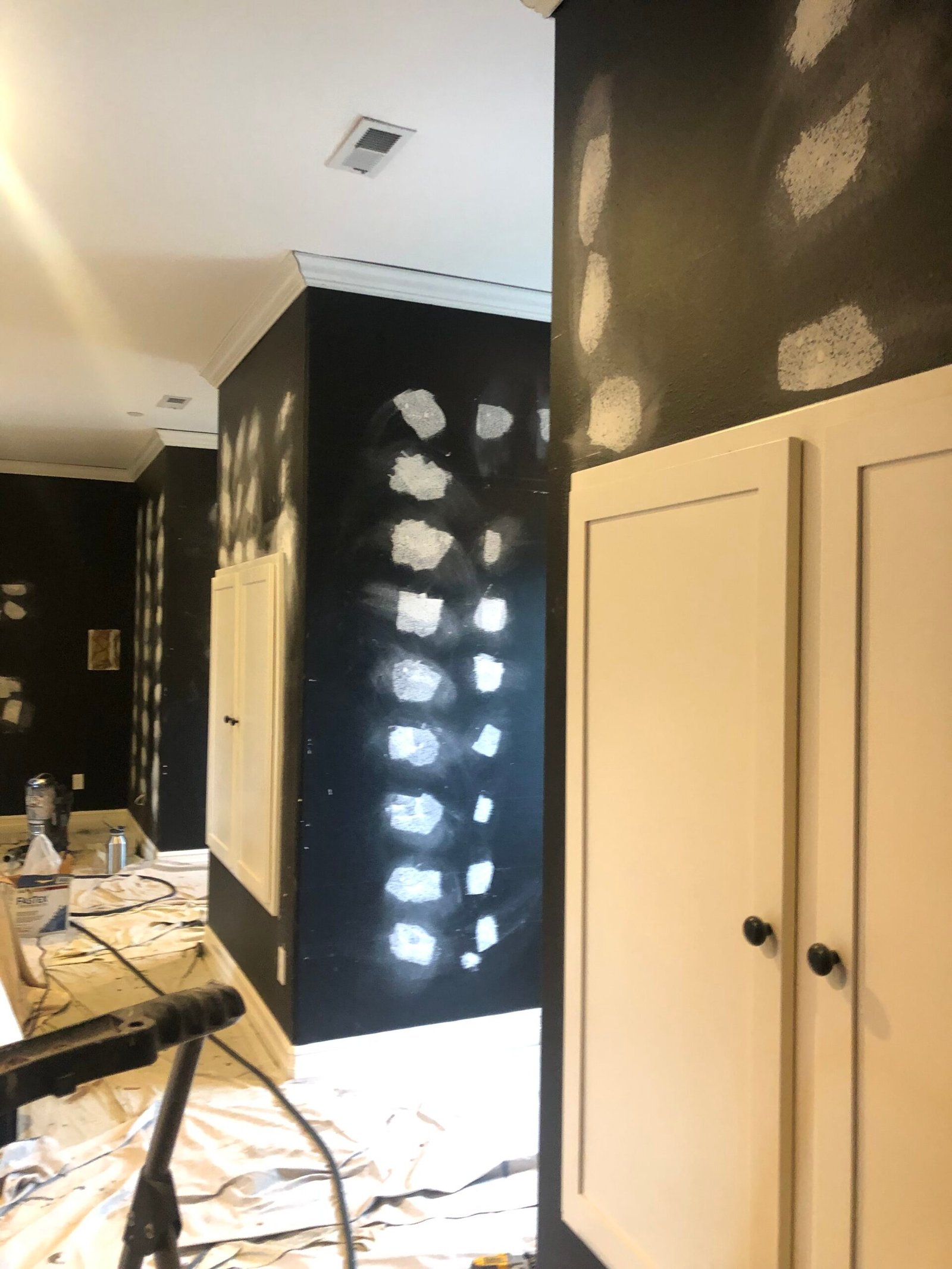 Detailed drywall repairs in theater
