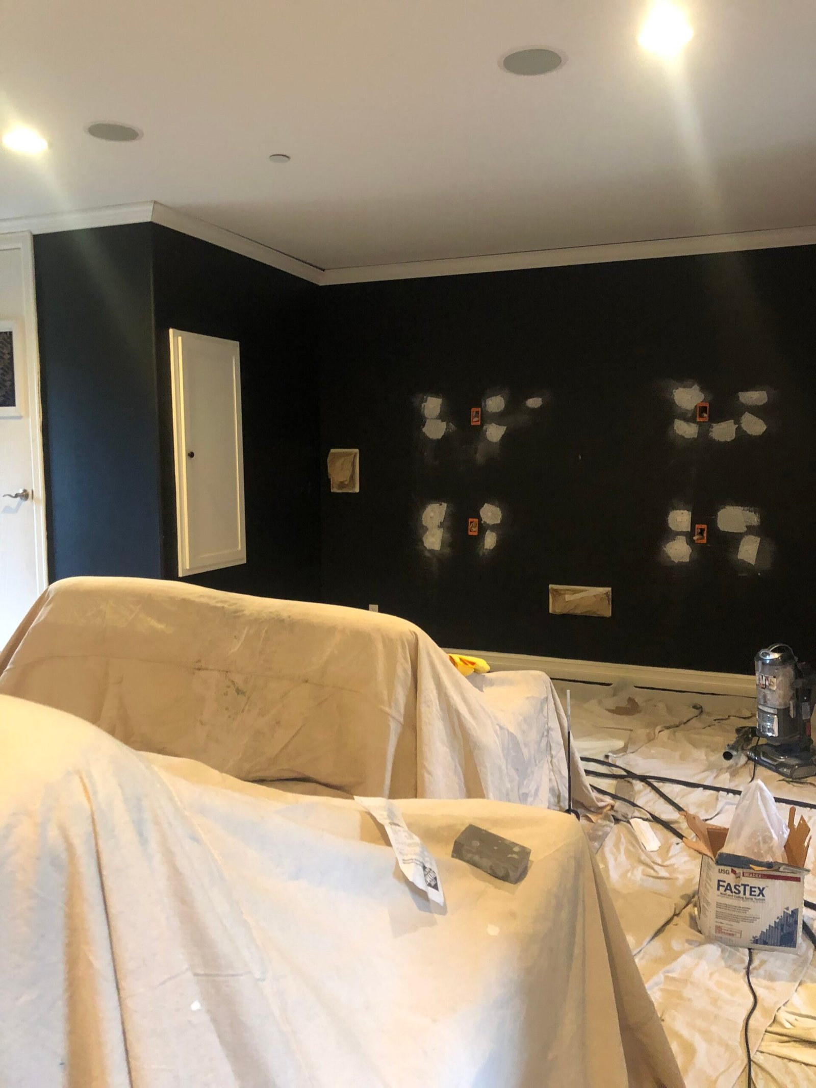 Theater wall repairs in progress
