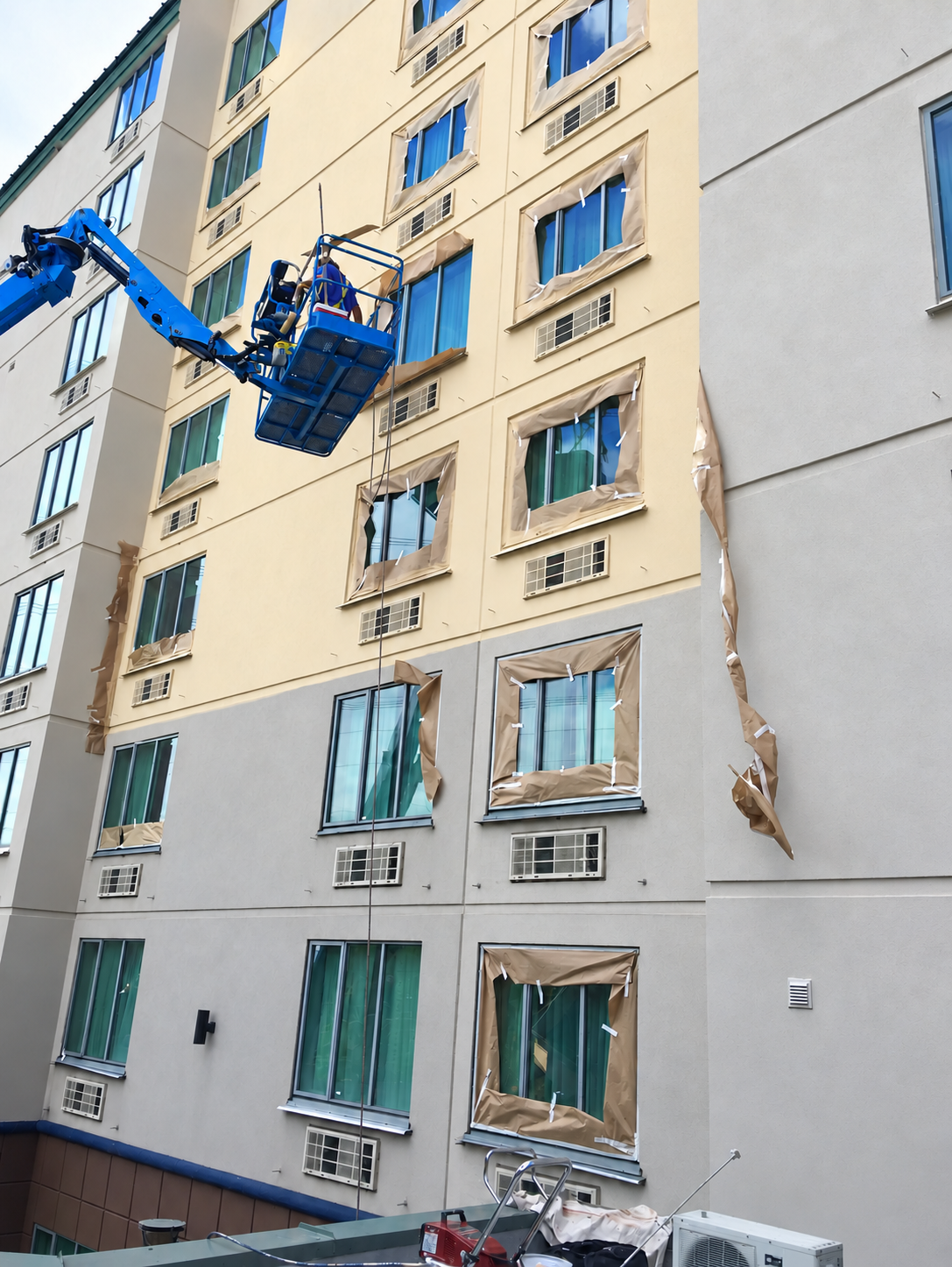 Best Western exterior painting finished in warm off-white